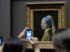 Johannes Vermeer's Girl with a Pearl Earring is one of 15 17th-century Dutch paintings on view at New York's Frick Collection through early 2014. Johannes Vermeer's Girl with a Pearl Earring is one of 15 17th-century Dutch paintings on view at New York's Frick Collection through early 2014.